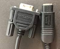 Close-up on part numbers of HP serial cable for 200LX (F1015-80002) and 10-pin to 4-socket adapter for use with HP 95LX (5181-6643).JPG